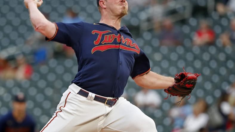 Sep 15, 2022; Minneapolis, Minnesota, USA; Minnesota Twins starting pitcher Dylan Bundy (37) throws to the Kansas City Royals in the first inning at Target Field. Mandatory Credit: Bruce Kluckhohn-USA TODAY Sports