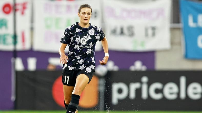 Sep 16, 2022; Louisville, Kentucky, USA; Racing Louisville FC midfielder Savannah DeMelo (7) dribbles the ball against the Orlando Pride during the first half at Lynn Family Stadium. Mandatory Credit: EM Dash-USA TODAY Sports