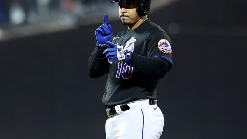 Sep 16, 2022; New York City, New York, USA; New York Mets third baseman Eduardo Escobar (10) reacts after hitting a double against the Pittsburgh Pirates during the seventh inning at Citi Field. Mandatory Credit: Brad Penner-USA TODAY Sports