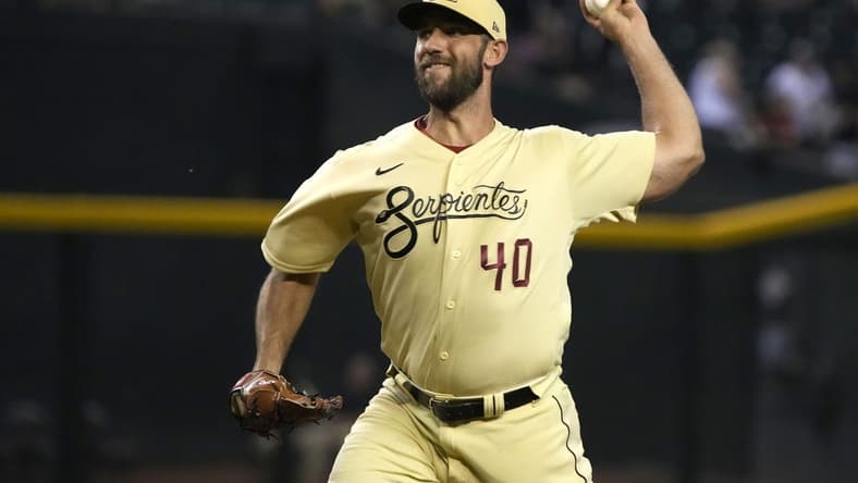 Sep 16, 2022; Phoenix, Arizona, USA; Arizona Diamondbacks starting pitcher Madison Bumgarner (40) throws against the San Diego Padres in the first inning at Chase Field. Mandatory Credit: Rick Scuteri-USA TODAY Sports