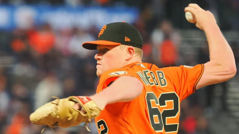 Sep 16, 2022; San Francisco, California, USA; San Francisco Giants starting pitcher Logan Webb (62) pitches the ball against the Los Angeles Dodgers during the first inning at Oracle Park. Mandatory Credit: Kelley L Cox-USA TODAY Sports