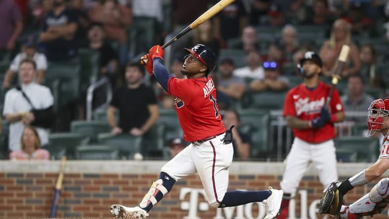 Sep 16, 2022; Atlanta, Georgia, USA; Atlanta Braves second baseman Ozzie Albies (1) hits a two run RBI double against the Philadelphia Phillies in the eighth inning at Truist Park. Mandatory Credit: Brett Davis-USA TODAY Sports