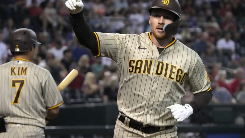 Sep 16, 2022; Phoenix, Arizona, USA; San Diego Padres first baseman Brandon Drury (17) reacts to the fans after hitting a homerun against the Arizona Diamondbacks in the fourth inning at Chase Field. Mandatory Credit: Rick Scuteri-USA TODAY Sports