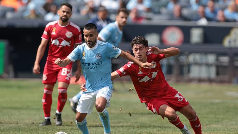 Sep 17, 2022; New York, New York, USA; New York City FC midfielder Maximiliano Moralez (10) plays the ball as New York Red Bulls midfielder Caden Clark (37) defends during the first half at Yankee Stadium. Mandatory Credit: Vincent Carchietta-USA TODAY Sports