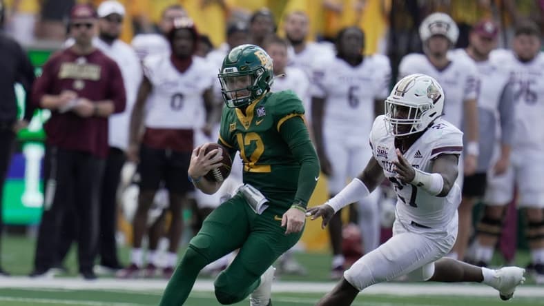 Sep 17, 2022; Waco, Texas, USA;  Baylor Bears quarterback Blake Shapen (12) is chased by Texas State Bobcats linebacker London Harris (27) during the first half at McLane Stadium. Mandatory Credit: Chris Jones-USA TODAY Sports