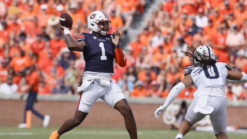 Sep 17, 2022; Auburn, Alabama, USA; Auburn Tigers quarterback T.J. Finley (1) throws a pass against the Penn State Nittany Lions during the first quarter at Jordan-Hare Stadium. Mandatory Credit: John Reed-USA TODAY Sports