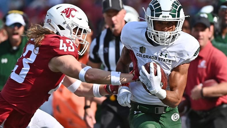 Sep 17, 2022; Pullman, Washington, USA; Colorado State Rams wide receiver Ty McCullouch (6) is pushed pout of bounds by Washington State Cougars linebacker Ben Wilson (43) in the first half at Gesa Field at Martin Stadium. Mandatory Credit: James Snook-USA TODAY Sports