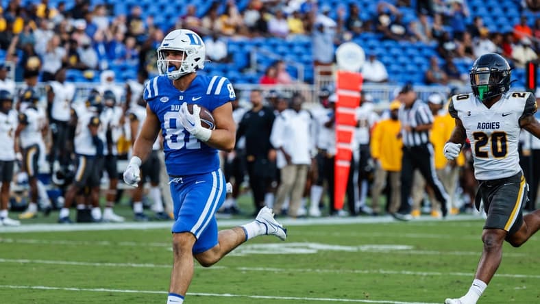 Sep 17, 2022; Durham, North Carolina, USA;  Duke Blue Devils tight end Nicky Dalmolin (81) scores a touchdown against the North Carolina A&T Aggies during the first half at Wallace Wade Stadium. Mandatory Credit: Jaylynn Nash-USA TODAY Sports