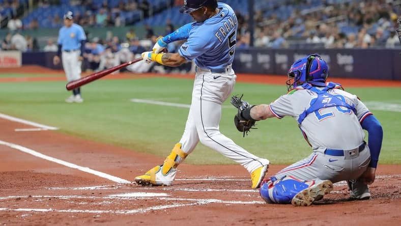 Sep 17, 2022; St. Petersburg, Florida, USA; Tampa Bay Rays shortstop Wander Franco (5) at bat during the first inning against the Texas Rangers at Tropicana Field. Mandatory Credit: Mike Watters-USA TODAY Sports