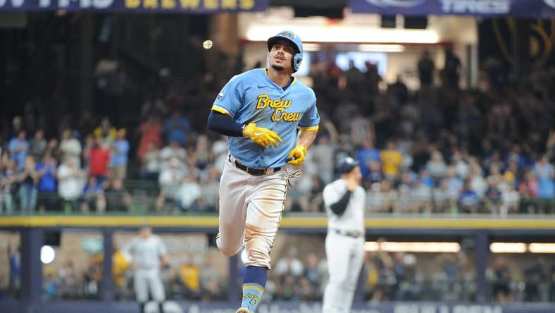 Sep 17, 2022; Milwaukee, Wisconsin, USA; Milwaukee Brewers shortstop Willy Adames (27) rounds the bases after hitting a home run against the New York Yankees in the third inning at American Family Field. Mandatory Credit: Michael McLoone-USA TODAY Sports