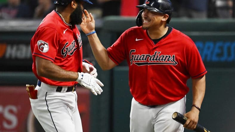Sep 17, 2022; Cleveland, Ohio, USA; Cleveland Guardians shortstop Amed Rosario, left, celebrates with first baseman Josh Naylor after hitting a home run during the fifth inning against the Minnesota Twins at Progressive Field. Mandatory Credit: Ken Blaze-USA TODAY Sports