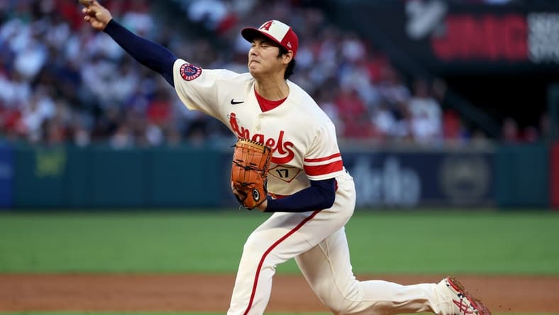 Sep 17, 2022; Anaheim, California, USA; Los Angeles Angels two-way player Shohei Ohtani (17) pitches during the second inning against the Seattle Mariners at Angel Stadium. Mandatory Credit: Kiyoshi Mio-USA TODAY Sports