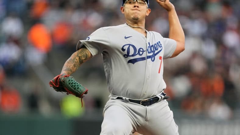 Sep 17, 2022; San Francisco, California, USA; Los Angeles Dodgers starting pitcher Julio Urias (7) throws a pitch against the San Francisco Giants during the first inning at Oracle Park. Mandatory Credit: Darren Yamashita-USA TODAY Sports