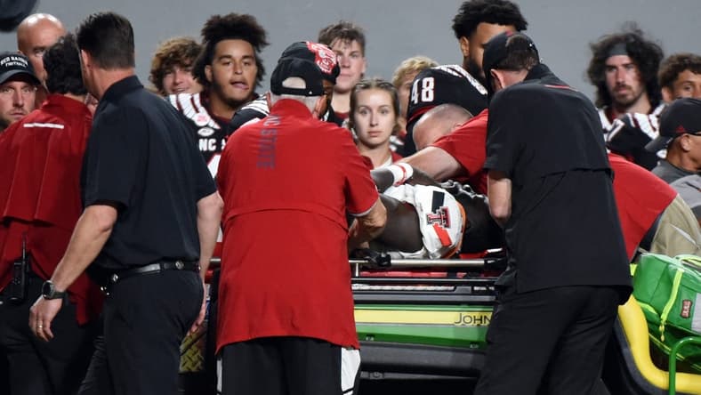 Sep 17, 2022; Raleigh, North Carolina, USA; Texas Tech Red Raiders linebacker Bryce Ramirez (54) is carted off the field after suffering an apparent injury during the first half against the North Carolina State Wolfpack at Carter-Finley Stadium. Mandatory Credit: Rob Kinnan-USA TODAY Sports