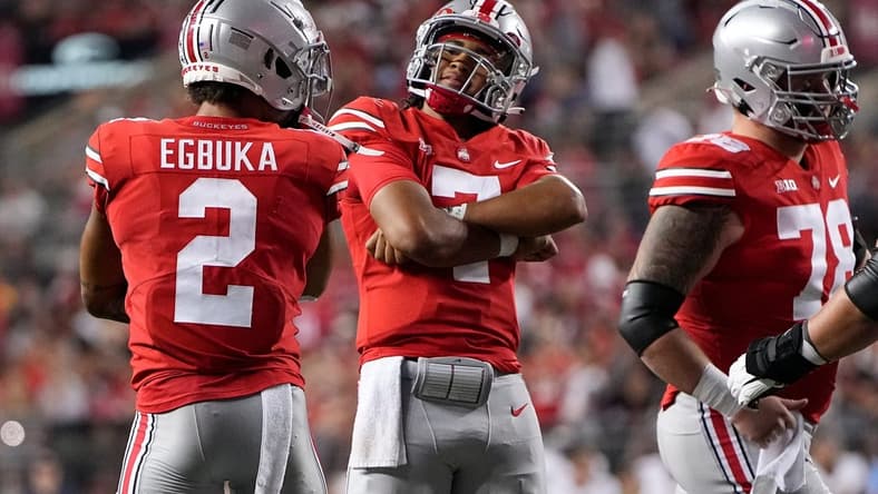 Sep 17, 2022; Columbus, Ohio, USA; Ohio State Buckeyes quarterback C.J. Stroud (7) celebrates a touchdown with wide receiver Emeka Egbuka (2) during the second half of the NCAA Division I football game against the Toledo Rockets at Ohio Stadium. Ohio State won 77-21. Mandatory Credit: Adam Cairns-The Columbus Dispatch

Ncaa Football Toledo Rockets At Ohio State Buckeyes