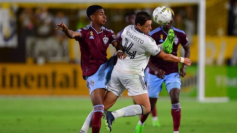 Sep 17, 2022; Carson, California, USA; Colorado Rapids midfielder Max (8) plays for the ball against Los Angeles Galaxy forward Javier Hernandez (14) during the second half at Dignity Health Sports Park. Mandatory Credit: Gary A. Vasquez-USA TODAY Sports