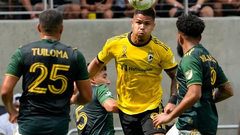 Sep 18, 2022; Columbus, Ohio, USA; Columbus Crew forward Cucho Hernandez (9) heads a ball over Portland Timbers midfielder Eryk Williamson (19) during the first half of the MLS game at Lower.com Field. Mandatory Credit: Adam Cairns-The Columbus Dispatch

Mls Portland Timbers At Columbus Crew