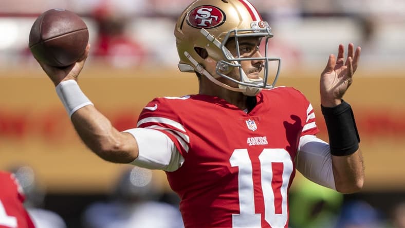 September 18, 2022; Santa Clara, California, USA; San Francisco 49ers quarterback Jimmy Garoppolo (10) passes the football against the Seattle Seahawks during the second quarter at Levi's Stadium. Mandatory Credit: Kyle Terada-USA TODAY Sports