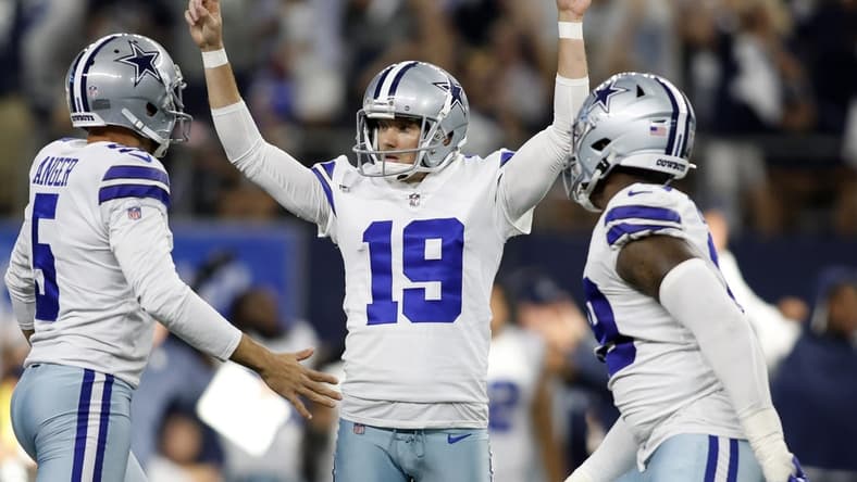 Sep 18, 2022; Arlington, Texas, USA; Dallas Cowboys place kicker Brett Maher (19) and punter Bryan Anger (5) celebrate the game winning field goal at the end of the game against the Cincinnati Bengals at AT&T Stadium. Mandatory Credit: Tim Heitman-USA TODAY Sports