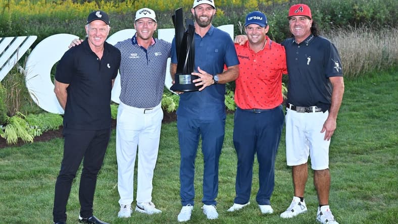 Sep 18, 2022; Chicago, Illinois, USA; LIV Golf CEO Greg Norman, far left, poses with Talor Gooch, Dustin Johnson, Patrick Reed and Pat Perez, all members of the 4 Aces GC, after they won the team competition of the Invitational Chicago LIV Golf tournament at Rich Harvest Farms. Mandatory Credit: Jamie Sabau-USA TODAY Sports