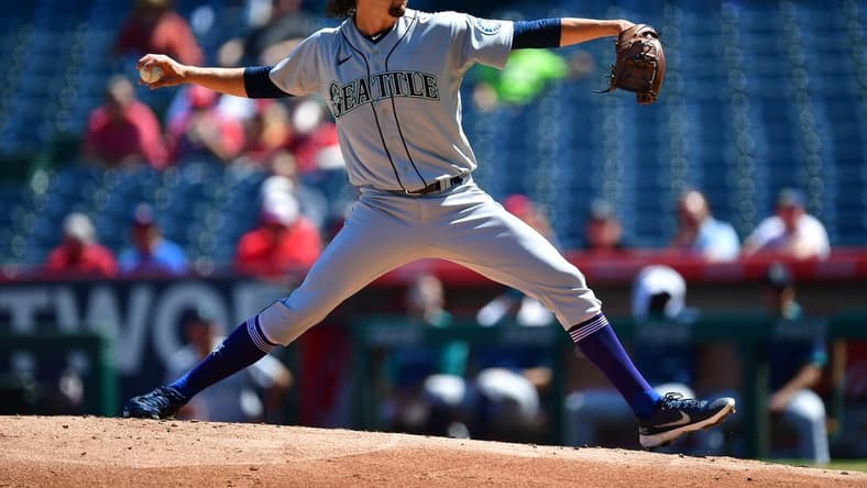 Sep 19, 2022; Anaheim, California, USA; Seattle Mariners starting pitcher Logan Gilbert (36) throws against the Los Angeles Angels during the first inning at Angel Stadium. Mandatory Credit: Gary A. Vasquez-USA TODAY Sports