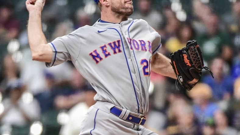 Sep 19, 2022; Milwaukee, Wisconsin, USA; New York Mets pitcher Max Scherzer (21) throws a pitch in the first inning against the Milwaukee Brewers at American Family Field. Mandatory Credit: Benny Sieu-USA TODAY Sports
