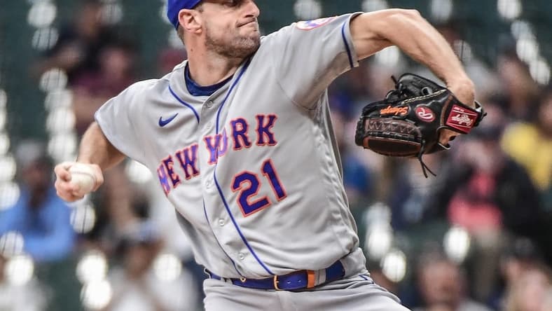 Sep 19, 2022; Milwaukee, Wisconsin, USA; New York Mets pitcher Max Scherzer (21) throws a pitch in the first inning against the Milwaukee Brewers at American Family Field. Mandatory Credit: Benny Sieu-USA TODAY Sports