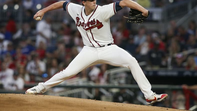 Sep 19, 2022; Atlanta, Georgia, USA; Atlanta Braves starting pitcher Kyle Wright (30) throws against the Washington Nationals in the second inning at Truist Park. Mandatory Credit: Brett Davis-USA TODAY Sports