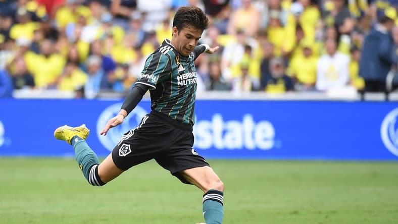 Sep 10, 2022; Nashville, Tennessee, USA; Los Angeles Galaxy midfielder Riqui Puig (6) attempts a shot during the first half against the Nashville SC at Geodis Park. Mandatory Credit: Christopher Hanewinckel-USA TODAY Sports