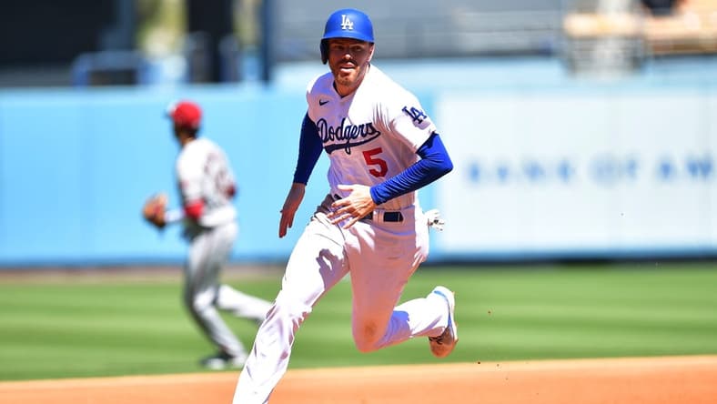 Sep 20, 2022; Los Angeles, California, USA; Los Angeles Dodgers first baseman Freddie Freeman (5) advances to third against the Arizona Diamondbacks during the third inning at Dodger Stadium. Mandatory Credit: Gary A. Vasquez-USA TODAY Sports