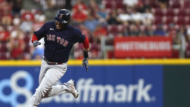 Sep 20, 2022; Cincinnati, Ohio, USA; Boston Red Sox designated hitter J.D. Martinez (28) rounds the bases after hitting and RBI triple against the Cincinnati Reds during the third inning at Great American Ball Park. Mandatory Credit: David Kohl-USA TODAY Sports