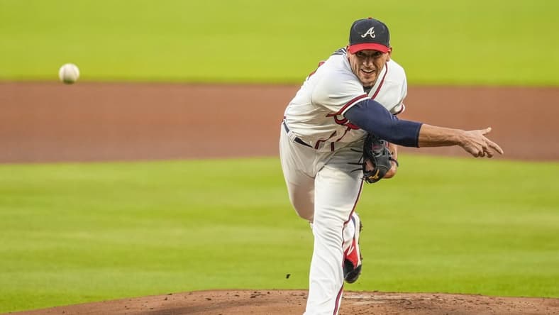 Sep 20, 2022; Cumberland, Georgia, USA; Atlanta Braves starting pitcher Charlie Morton (50) pitches against the Washington Nationals during the first inning at Truist Park. Mandatory Credit: Dale Zanine-USA TODAY Sports