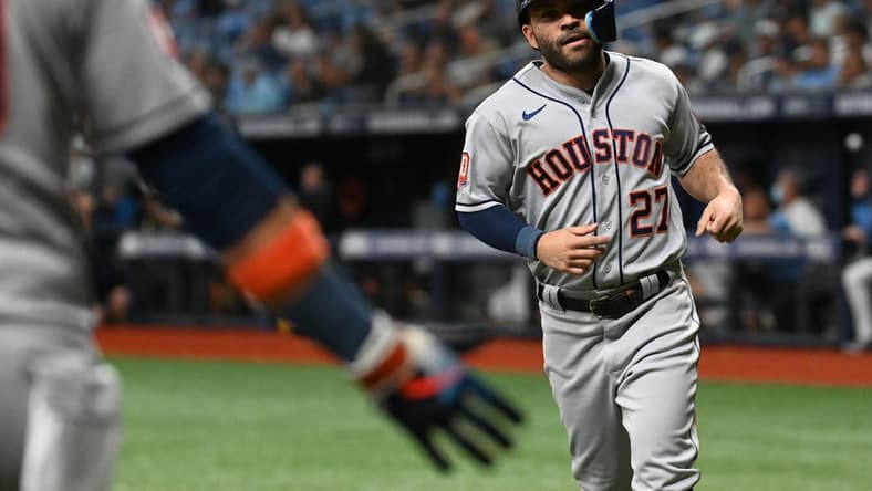 Sep 20, 2022; St. Petersburg, Florida, USA; Houston Astros second baseman Jose Altuve (27) scores a run in the fifth inning against the Tampa Bay Rays at Tropicana Field. Mandatory Credit: Jonathan Dyer-USA TODAY Sports