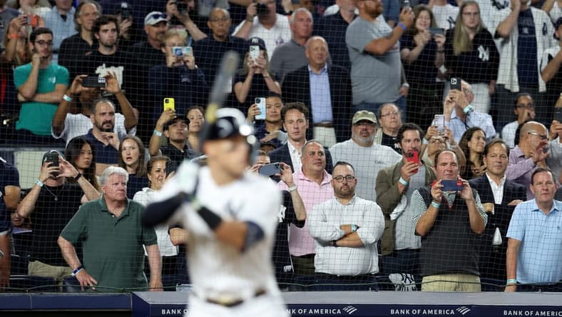 Sep 20, 2022; Bronx, New York, USA; Fans watch as New York Yankees right fielder Aaron Judge (99) bats against the Pittsburgh Pirates during the sixth inning at Yankee Stadium. Mandatory Credit: Brad Penner-USA TODAY Sports