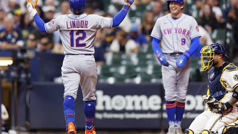 Sep 20, 2022; Milwaukee, Wisconsin, USA; New York Mets shortstop Francisco Lindor (12) celebrates after hitting a grand slam home run during the seventh inning against the Milwaukee Brewers at American Family Field. Mandatory Credit: Jeff Hanisch-USA TODAY Sports