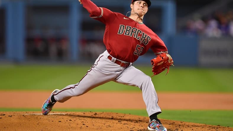 Sep 20, 2022; Los Angeles, California, USA; Arizona Diamondbacks relief pitcher Drey Jameson (58) throws against the Los Angeles Dodgers during the second inning at Dodger Stadium. Mandatory Credit: Gary A. Vasquez-USA TODAY Sports