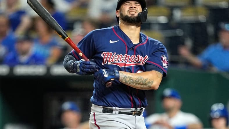 Sep 20, 2022; Kansas City, Missouri, USA; Minnesota Twins catcher Gary Sanchez (24) reacts after being hit by a pitch during the eighth inning against the Kansas City Royals at Kauffman Stadium. Mandatory Credit: Jay Biggerstaff-USA TODAY Sports