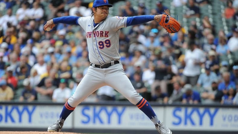 Sep 21, 2022; Milwaukee, Wisconsin, USA; New York Mets starting pitcher Taijuan Walker (99) delivers a pitch against the Milwaukee Brewers in the fourth inning at American Family Field. Mandatory Credit: Michael McLoone-USA TODAY Sports