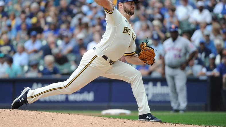Sep 21, 2022; Milwaukee, Wisconsin, USA; Milwaukee Brewers starting pitcher Adrian Houser (37) delivers a pitch against the New York Mets in the fourth inning at American Family Field. Mandatory Credit: Michael McLoone-USA TODAY Sports