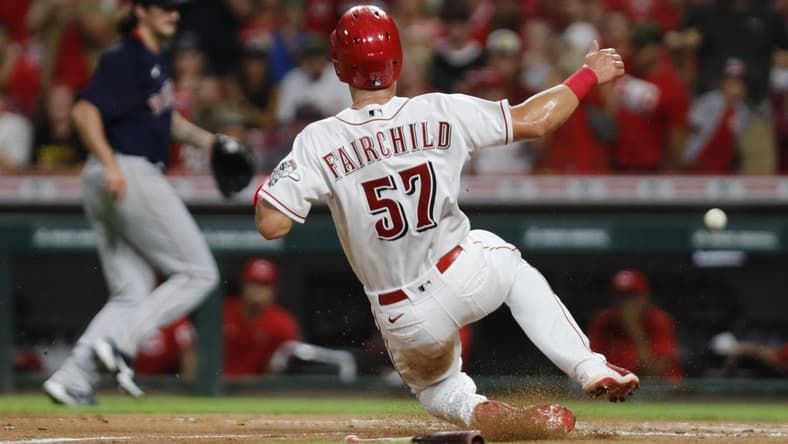 Sep 21, 2022; Cincinnati, Ohio, USA; Cincinnati Reds center fielder Stuart Fairchild (57) scores against the Boston Red Sox during the third inning at Great American Ball Park. Mandatory Credit: David Kohl-USA TODAY Sports