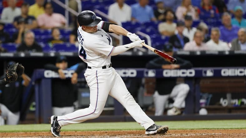 Sep 21, 2022; Miami, Florida, USA; Miami Marlins catcher Nick Fortes (54) hits a two-run home run during the fifth inning against the Chicago Cubs at loanDepot Park. Mandatory Credit: Sam Navarro-USA TODAY Sports