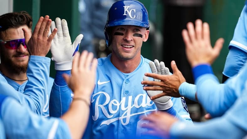 Sep 22, 2022; Kansas City, Missouri, USA; Kansas City Royals center fielder Drew Waters (6) is congratulated by teammates after hitting a home run during the fifth inning against the Minnesota Twins at Kauffman Stadium. Mandatory Credit: Jay Biggerstaff-USA TODAY Sports