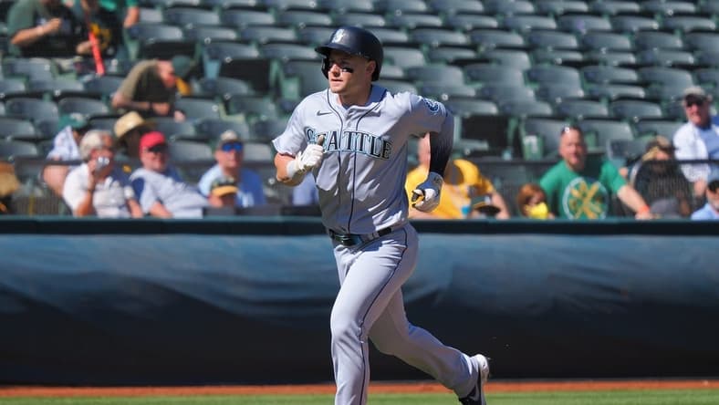 Sep 22, 2022; Oakland, California, USA; Seattle Mariners center fielder Jarred Kelenic (10) rounds the bases on a solo home run against the Oakland Athletics during the third inning at RingCentral Coliseum. Mandatory Credit: Kelley L Cox-USA TODAY Sports