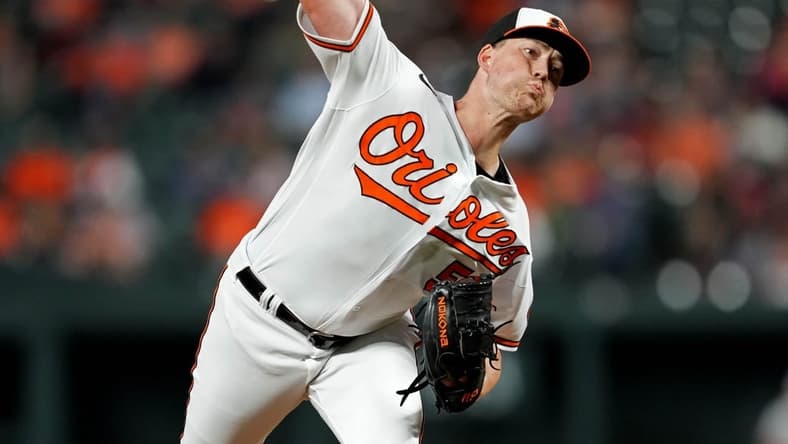 Sep 22, 2022; Baltimore, Maryland, USA; Baltimore Orioles pitcher Kyle Bradish (56) delivers in the first inning against the Houston Astros at Oriole Park at Camden Yards. Mandatory Credit: Mitch Stringer-USA TODAY Sports