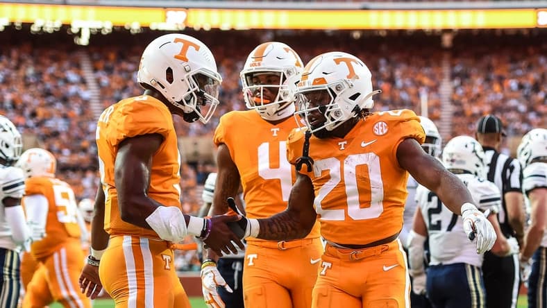 Sep 17, 2022; Knoxville, Tennessee, USA; Tennessee Volunteers running back Jaylen Wright (20) and quarterback Hendon Hooker (5) celebrate after a touchdown during the first half against the Akron Zips at Neyland Stadium. Mandatory Credit: Bryan Lynn-USA TODAY Sports
