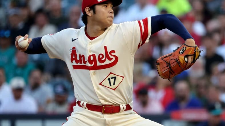 Sep 17, 2022; Anaheim, California, USA; Los Angeles Angels two-way player Shohei Ohtani (17) pitches during the first inning against the Seattle Mariners at Angel Stadium. Mandatory Credit: Kiyoshi Mio-USA TODAY Sports