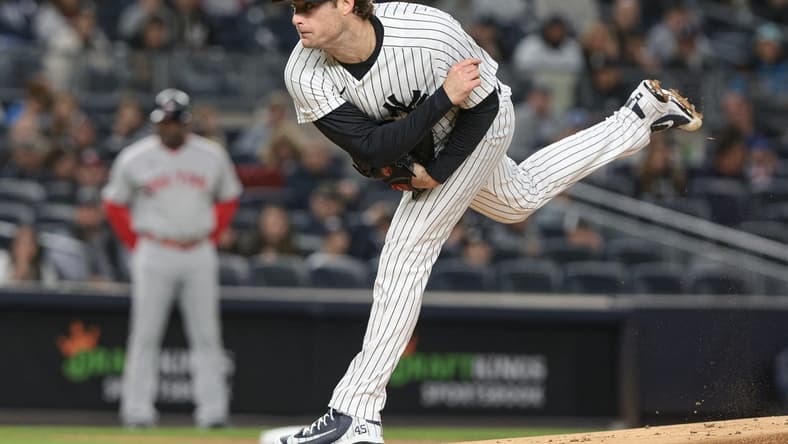 Sep 23, 2022; Bronx, New York, USA; New York Yankees starting pitcher Gerrit Cole (45) delivers a pitch during the first inning against the Boston Red Sox at Yankee Stadium. Mandatory Credit: Vincent Carchietta-USA TODAY Sports