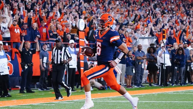 Sep 23, 2022; Syracuse, New York, USA; Syracuse Orange quarterback Garrett Shrader (6) runs with the ball for a touchdown against the Virginia Cavaliers during the first half at JMA Wireless Dome. Mandatory Credit: Gregory Fisher-USA TODAY Sports
