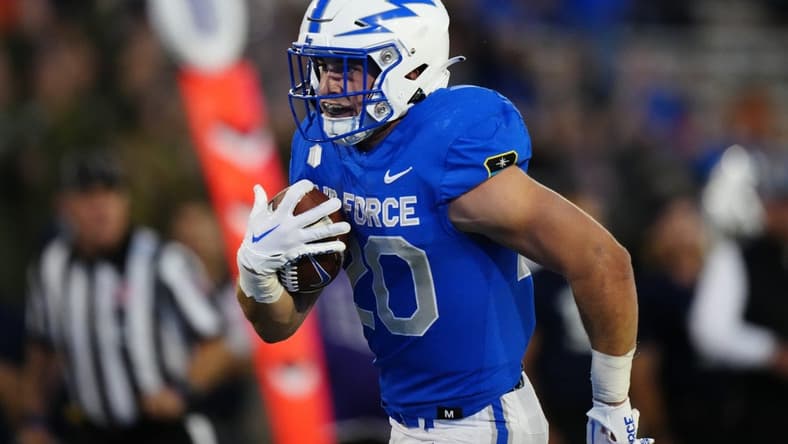 Sep 23, 2022; Colorado Springs, Colorado, USA; Air Force Falcons running back Brad Roberts (20) carries the ball in the second quarter against the Nevada Wolf Pack at Falcon Stadium. Mandatory Credit: Ron Chenoy-USA TODAY Sports