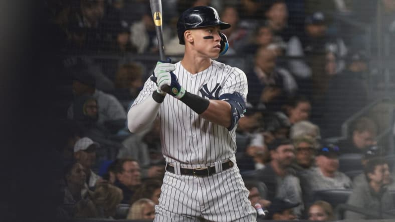 Sep 23, 2022; Bronx, New York, USA; New York Yankees center fielder Aaron Judge (99) looks on from the undock circle during the seventh inning against the Boston Red Sox at Yankee Stadium. Mandatory Credit: Vincent Carchietta-USA TODAY Sports